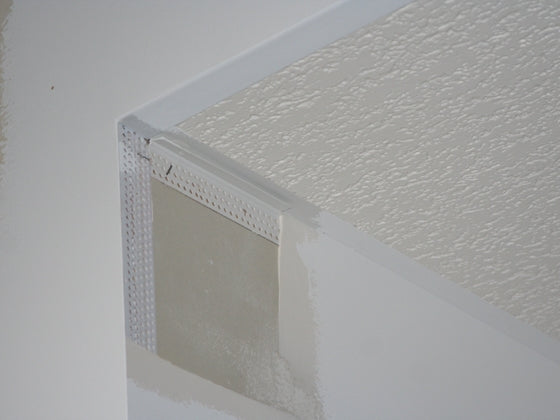 Reborde de barro en techo Trim-Tex